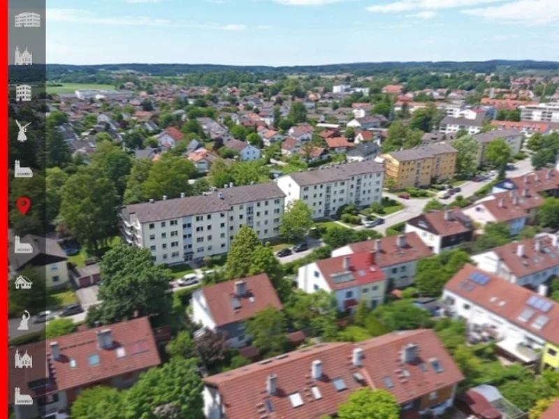 Außenansicht - Wohnung kaufen in Grafing - Hochparterre mit großem Gartenanteil: Sanierte 2-Zimmer-Wohnung mit Einbauküche