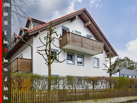 Hausansicht - Wohnung kaufen in München - Ihr neues Zuhause: schöne 3-Zimmer-Dachgeschosswohnung mit ruhigem Balkon und S-Bahn-Nähe