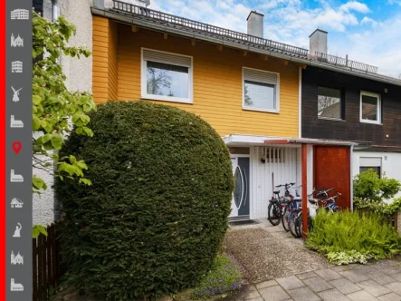 Hausansicht - Haus kaufen in München - Familienoase in begehrter Lage: Geräumiges Reihenmittelhaus mit Platz für alle Bedürfnisse