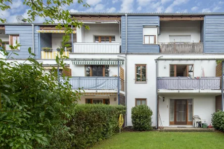 Titelbild - Wohnung kaufen in Poing - Attraktive 3-Zimmer-Maisonettewohnung in Poing bei München