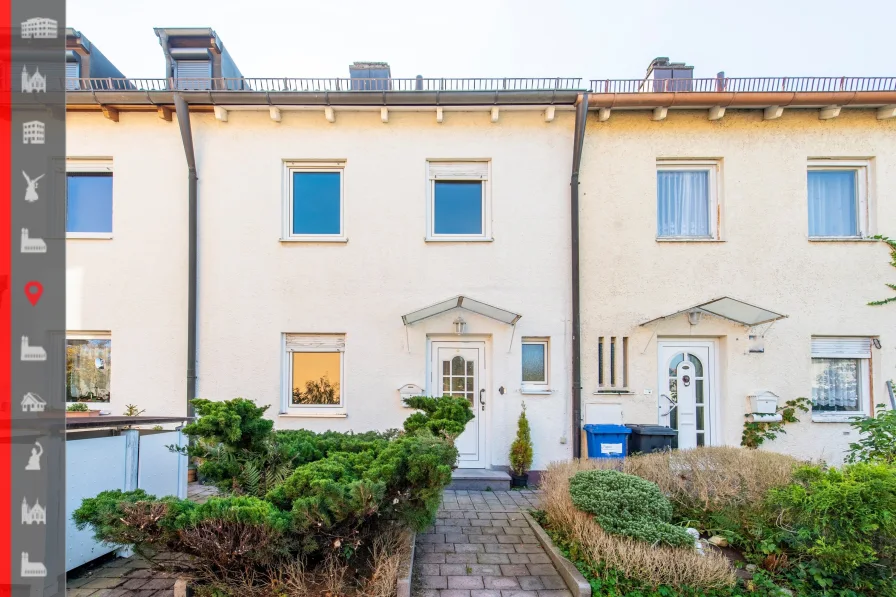 Objektansicht - Haus kaufen in München - Modernisierungsbedürftiges Reihenmittelhaus am beliebten Südpark in München - Obersendling