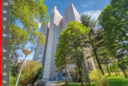 Hausansicht - Wohnung kaufen in Puchheim - Vermietete 1-Zimmer-Etagenwohnung mit Alpenblick