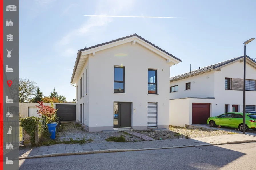 Hausansicht - Haus kaufen in Feldkirchen - Energieeffizientes modernes Einfamilienhaus mit großem Garten 