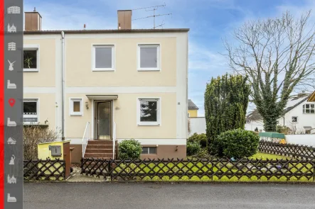 Hausansicht - Haus kaufen in Gröbenzell - freies Reiheneckhaus mit Südwestgarten in ruhiger Lage