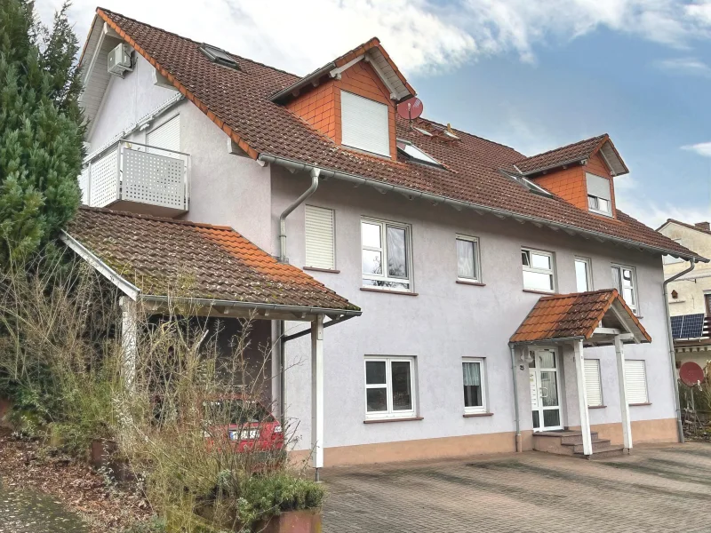 Außensansicht - Wohnung kaufen in Eschau - Gemütliche Wohnung mit Terrasse und Garten!