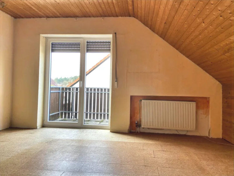 Elternschlafzimmer mit Zugang zum Balkon