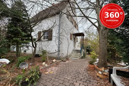 Haus- und Gartenansicht - Haus kaufen in Windsbach - Charaktervolles Einfamilienhaus von 1933 - Historischer Charme mit Renovierungspotential