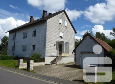 100736-1 - Haus kaufen in Tröstau - Ein-/Zweifamilienhaus in Tröstau