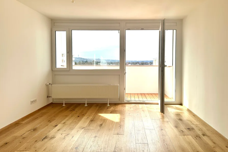 Wohnzimmer - Wohnung kaufen in Fürstenfeldbruck - Bergblickwohnung in Fürstenfeldbruck