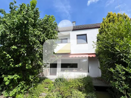 Titelbild - Haus kaufen in Erlangen - ruhig gelegenes RMH in der Reuth...Ein neues Zuhause für die ganze Familie