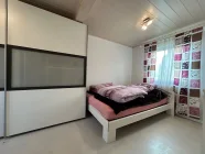 Schlafzimmer in der Einliegerwohnung