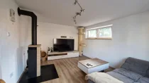 Wohnzimmer mit Holzofen