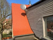 Dachfläche des Hauses mit Biberschwanz