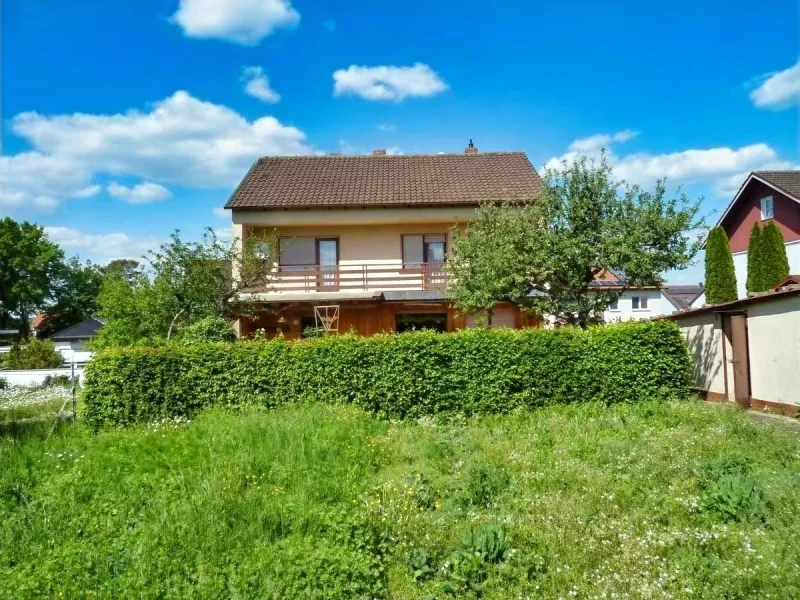 Von viel Sonne & Grün umgeben... die Gartenansicht