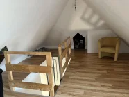 ausgebautes Zimmer im Spitzboden