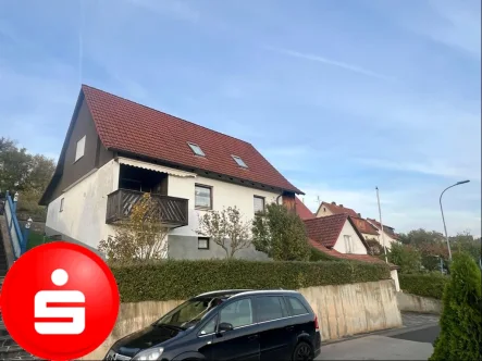 Außenansicht - Haus kaufen in Hollstadt - Einfamilienhaus mit Garage und Nebengebäude in 97618 Hollstadt