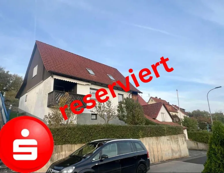 Außenansicht - Haus kaufen in Hollstadt - Einfamilienhaus mit Garage und Nebengebäude in 97618 Hollstadt