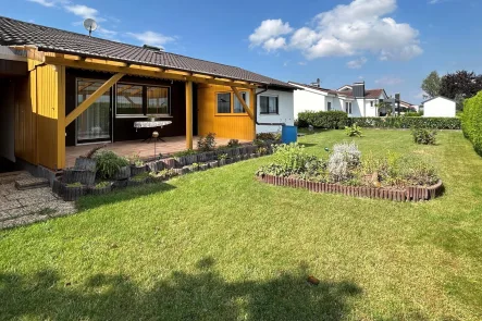 überdachte und geschützte Terrasse - Haus kaufen in Feldkirchen - Wohnen auf einer Ebene in der Stadtrandgemeinde Feldkirchen 