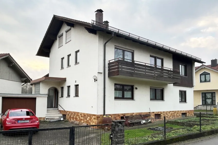 Titelbild - Haus kaufen in Bogen - Bodenständiges Einfamilienhaus in bester Lage in Bogen