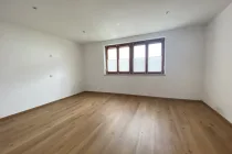 Schlafzimmer Erdgeschoss Haus 1 Wohnung 2