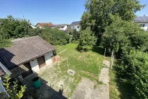 Ausblick in den Garten von der Dachterrasse