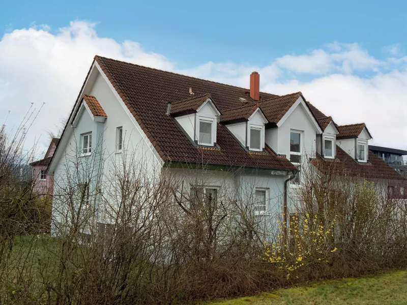 Seitenansicht - Wohnung kaufen in Stegaurach - Für Kapitalanleger: großzügige Zweizimmerwohnung in Stegaurach