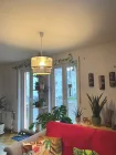 Wohnzimmer mit Balkon