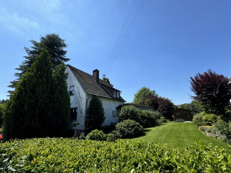  - Haus kaufen in Wölmersen - Gemütliches Einfamilienhaus mit großem Garten 