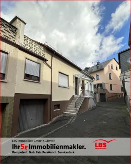 Titelbild - Haus kaufen in Kirn - Einladendes Reihenmittelhaus mit Terrasse und Potenzial in zentraler Lage