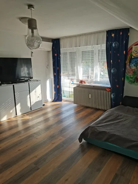 Wohnzimmer (2) - Wohnung kaufen in Bischweier - Viel Sonne und Blick ins Grüne