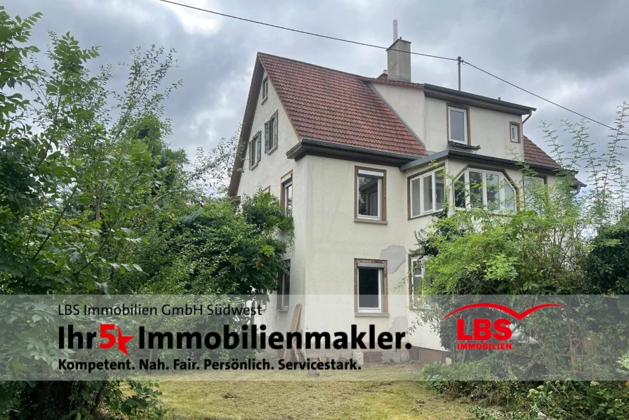 Außenansicht - Haus kaufen in Wannweil - Charmantes 3-Familien-Haus mit viel Potential 