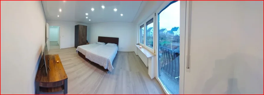 Schlafzimmer mit Balkon