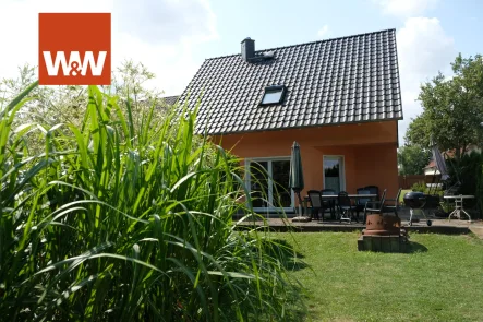 Ansicht - Haus kaufen in Naunhof / Ammelshain - Traumhaftes Einfamilienhaus in ruhiger Lage mit großem Garten und moderner Ausstattung