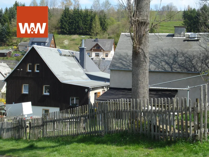 Ansicht - Haus kaufen in Jöhstadt / Steinbach - Einfamilienhaus mit Sanierungsbedarf und großem Nebengebäude