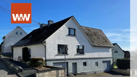 Titelbild  - Haus kaufen in Unnau - Charmantes Eigenheim in Unnau - Stangenrod: Ideal für die kleine Familie!