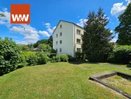 Sitz- und Spielplatz mit Sicht auf Haus 1