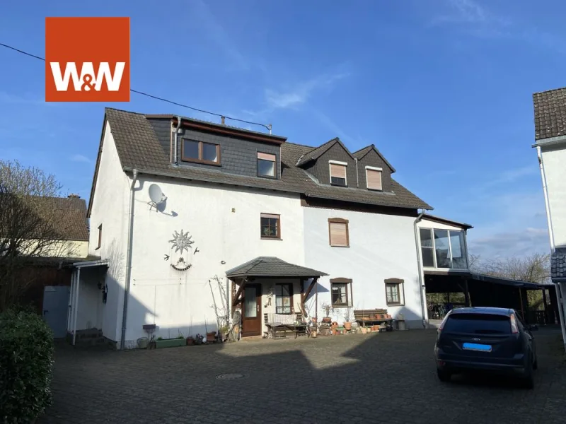 Haus 1 linke DHH - Haus kaufen in Singhofen - Einfamilienhaus (DHH), 2 PKW-Stellplätzein zentraler Wohnlage