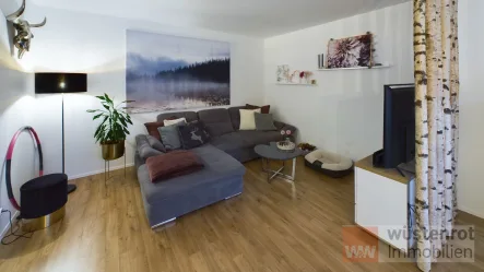 Wohnzimmer - Wohnung kaufen in Sarstedt - Moderne 2-Zimmer-Eigentumswohnung in Sarstedt – ideal für jedes Lebensalter