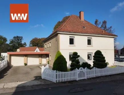 Ansicht - Haus kaufen in Lage-Hörste - Zweifamilienhaus mit großem Gartenhaus in Lage-Hörste