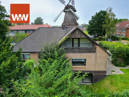 Titelfoto - Haus kaufen in Uplengen / Remels - Raumwunder-EFH mit großem Garten mitten in Remels