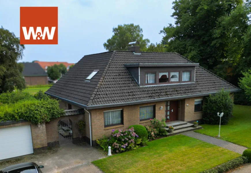 Titelfoto - Haus kaufen in Uplengen / Remels - Raumwunder-EFH mit großem Garten mitten in Remels