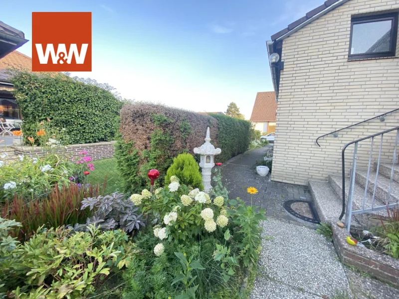 Bitte hier entlang - Haus kaufen in Tappenbeck - Modernisierter, gepfl., unterkellerter Bungalow auf schönem Grundstück (Erbbaurecht) in ruhiger Lage