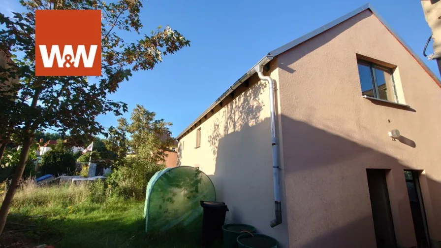 Blick vom Garten aus - Haus kaufen in Ottendorf-Okrilla - Ausbauobjekt mit ordentlich Wohnfläche - EFH mit kleinem Grundstück