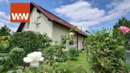 Ansicht Objekt - Haus kaufen in Hoyerswerda - Wohnperle in Hoyerswerda - familienfreundliches Architektenhaus in ruhiger Siedlung