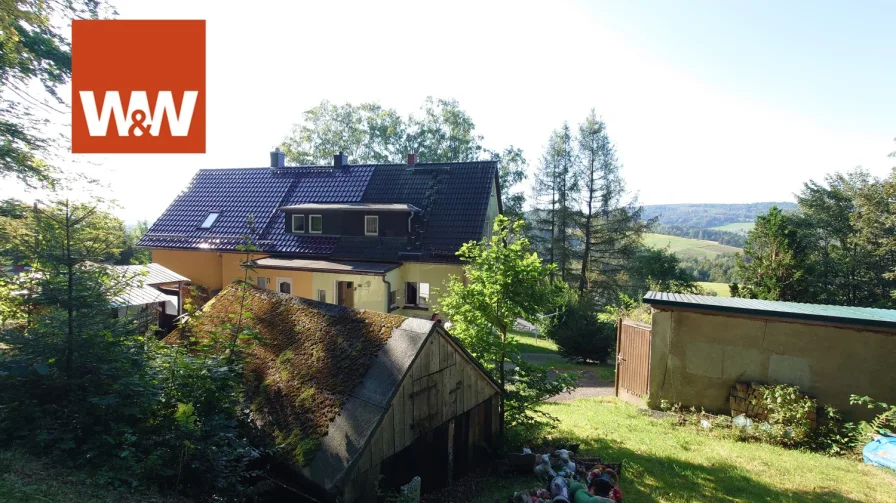 Blick auf das Doppelhaus - Haus kaufen in Sebnitz - Einmalig gelegene Doppelhaushälfte am Stadtrand von Sebnitz.