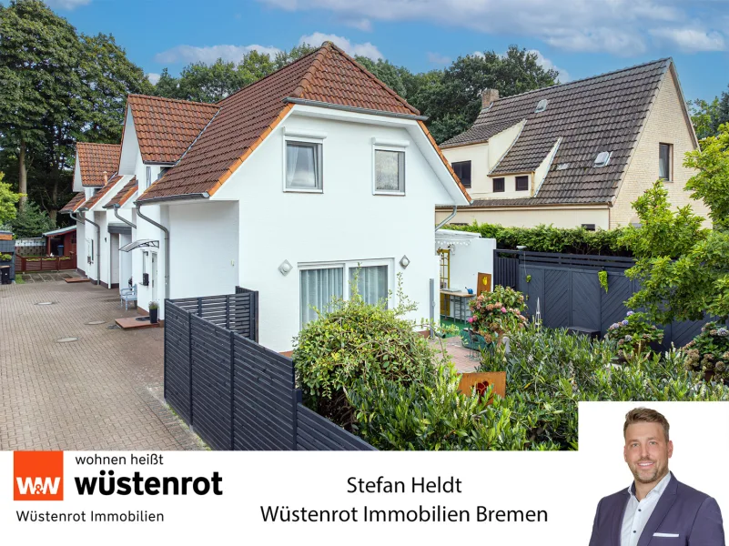 Titelbild - Haus kaufen in Bremen / Huchting - Attraktives Einfamilienhaus mit einladender überdachter Terrasse – Baujahr 1997