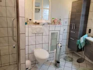 Duschbadezimmer mit barrierefreier Dusche