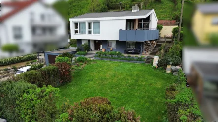 Außenansicht - Haus kaufen in Reutlingen-Sondelfingen - Zweifamilienhaus mit schönem Garten und Garage