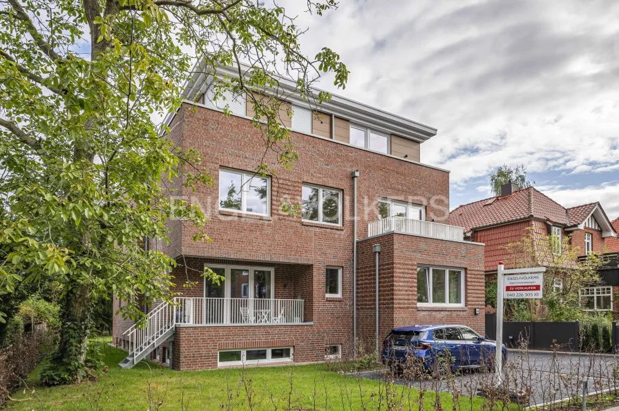 Hausansicht  - Wohnung kaufen in Hamburg - Energieeffizient und mit Liebe zum Detail - Maisonette-Wohnung mit eigenem Garten