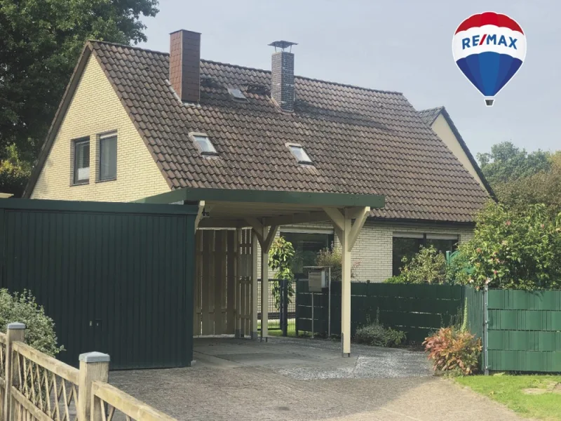 Anbauhaus mit Carport - Haus kaufen in Oldenburg - Zwei Wohneinheiten - ein Preis!Ruhige Wohnlage in Bloherfelde / Oldenburg